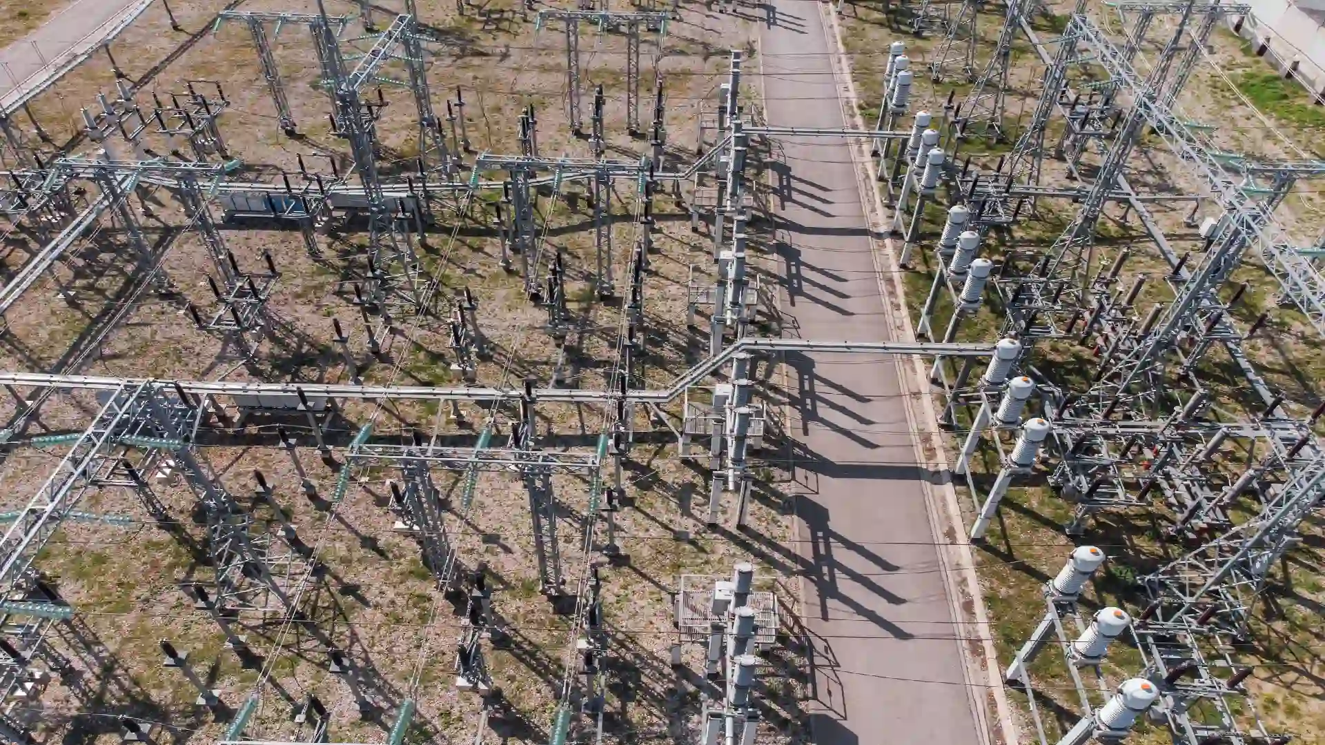medium aerial view of a high voltage electrical substation